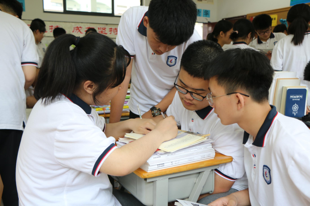 Students collaborating in class